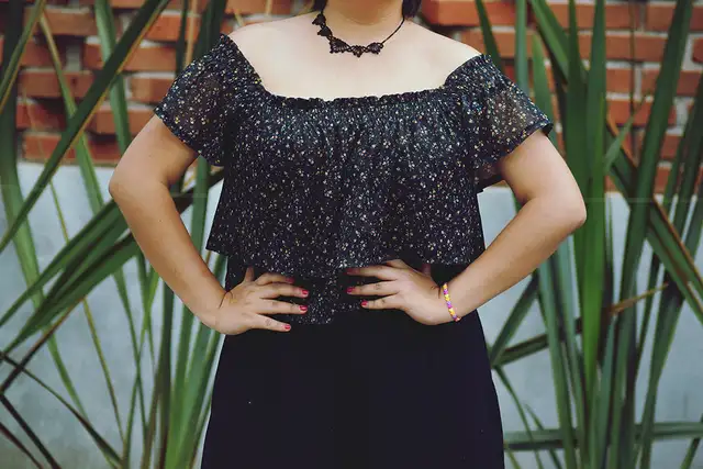 Discover the top dresses that flatter plus size figures and hide belly bumps. Find your perfect fit with our style guide for confidence and comfort!